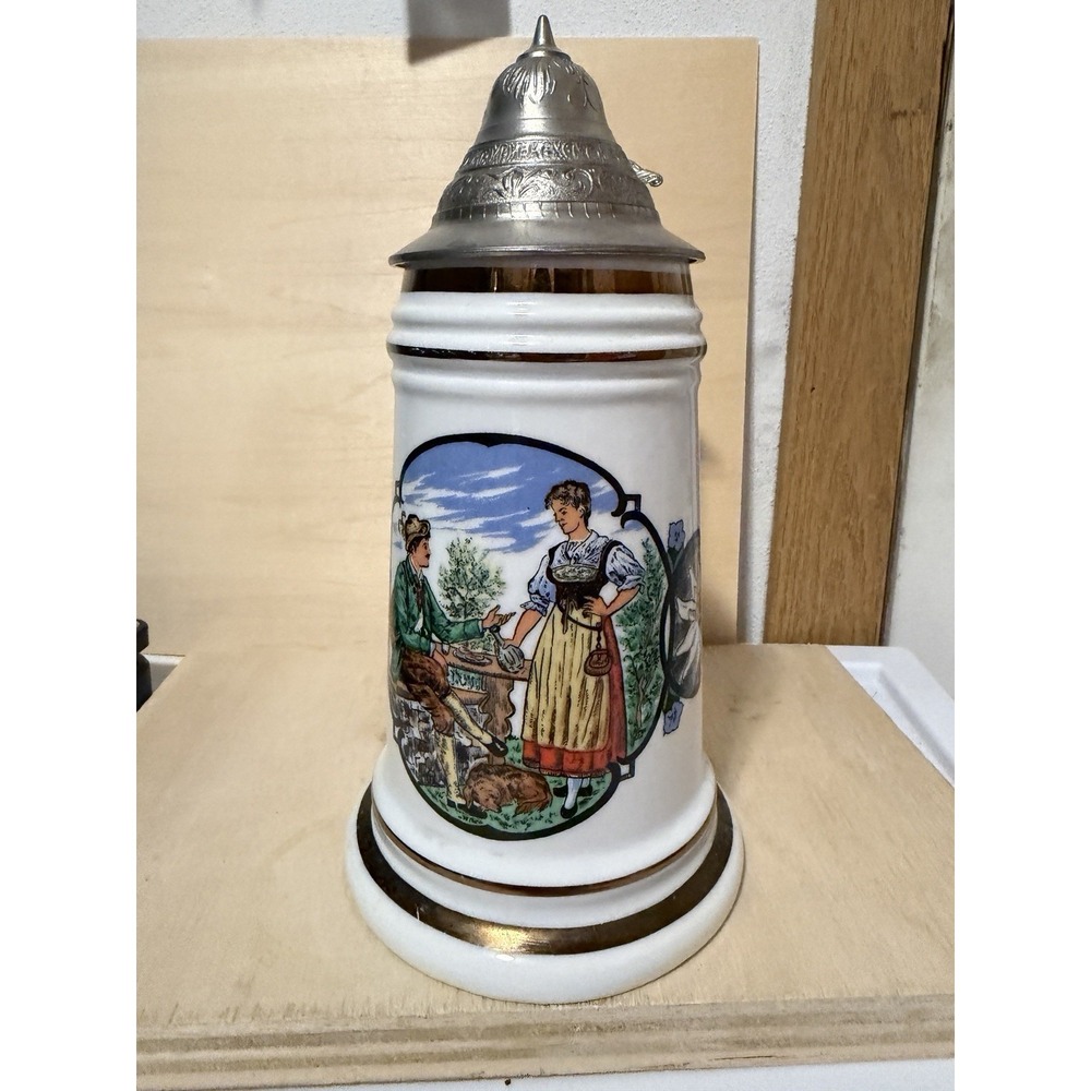 vintage German ceramic beer stein featuring a transfer print illustration